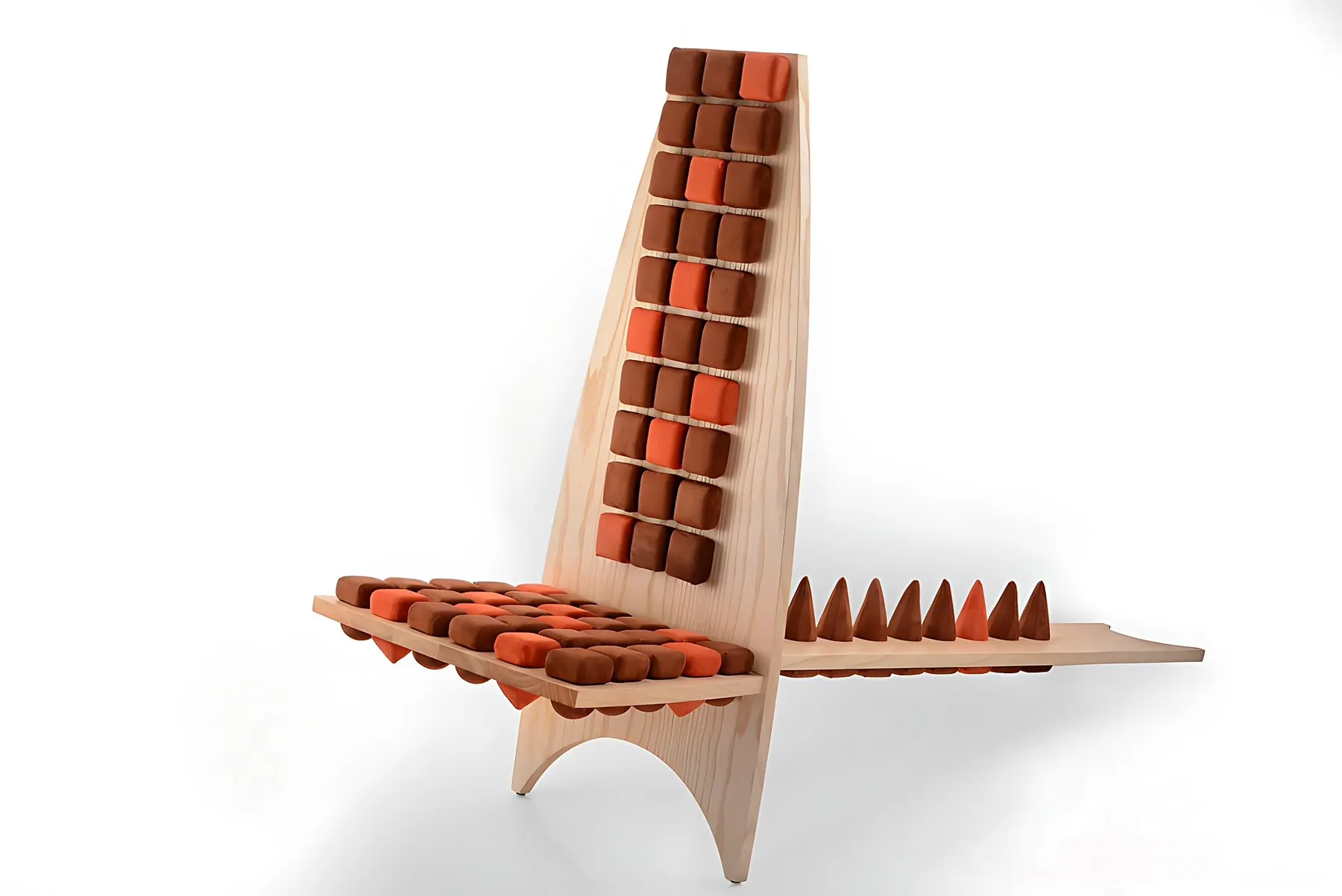 Side view of a low pale wood chair with brown and orange square cushions, Bog chair, Morphit
