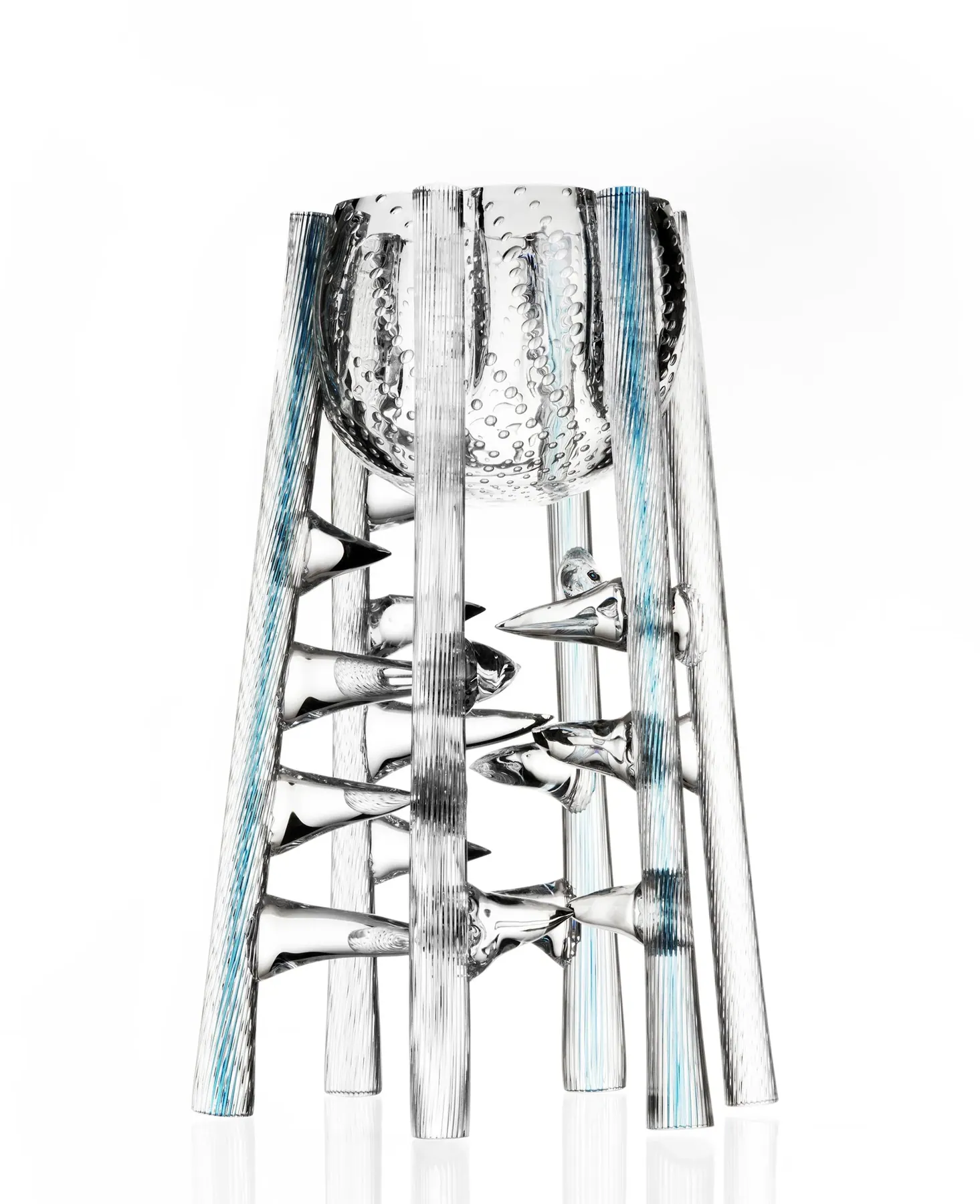 Clear crystal vessel raised on tall striped rods with spiky glass details, Crystal art pieces