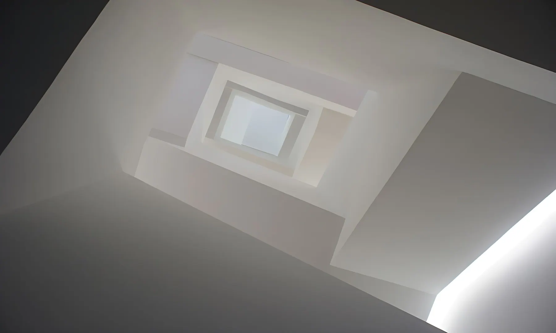 Looking up a white stairwell to a square skylight, Rose Lane townhouse, Shanghai